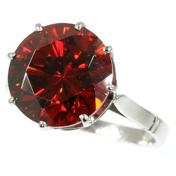 French estate platinum engagement ring with big orangy red stone